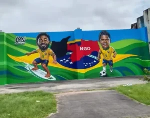 Mural no Estádio Almeidão homenageia os paraibanos Matheus Cunha e Douglas Santos pela participação na Copa do Mundo.